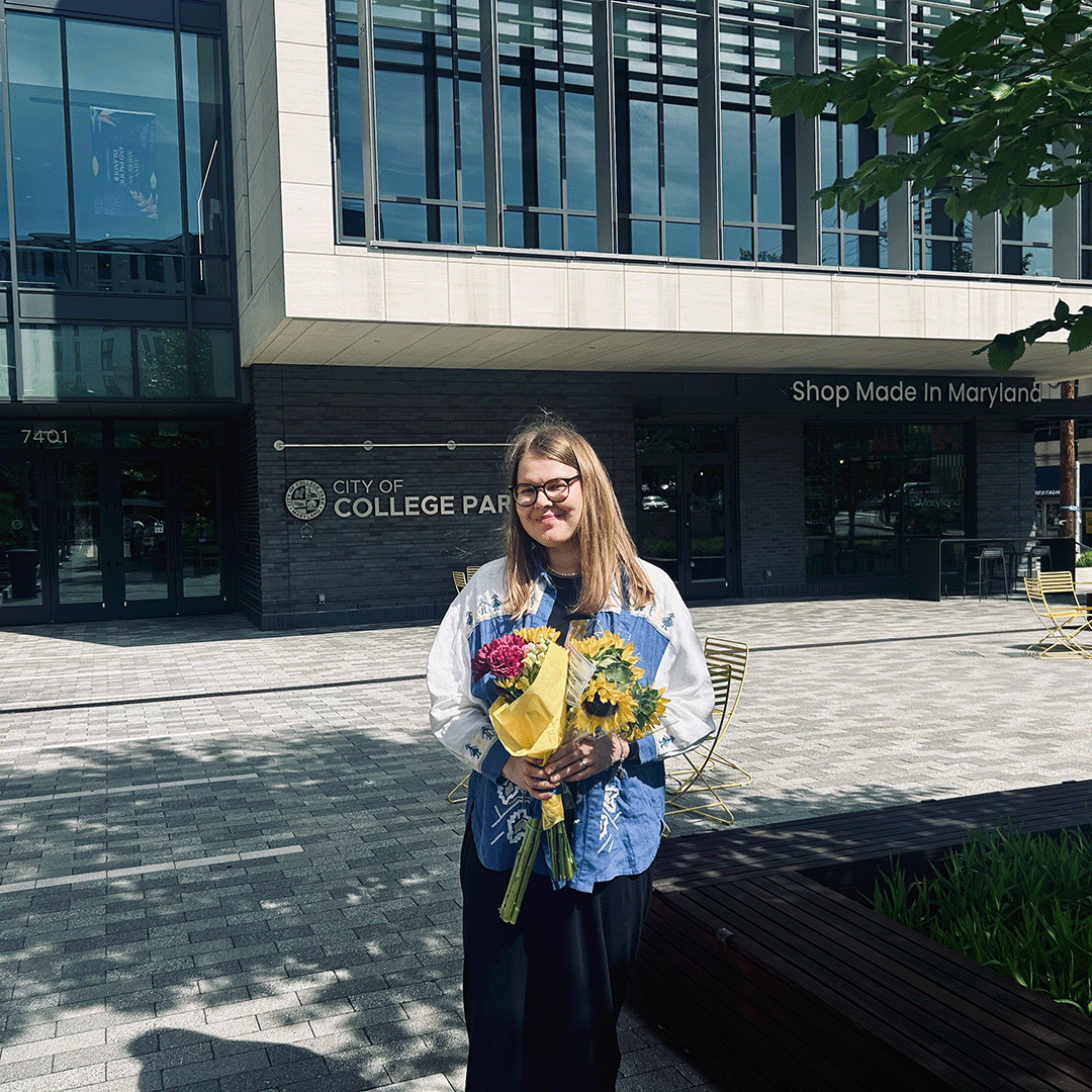 Viktoriia after her dissertation defense in College Park (May 2025)