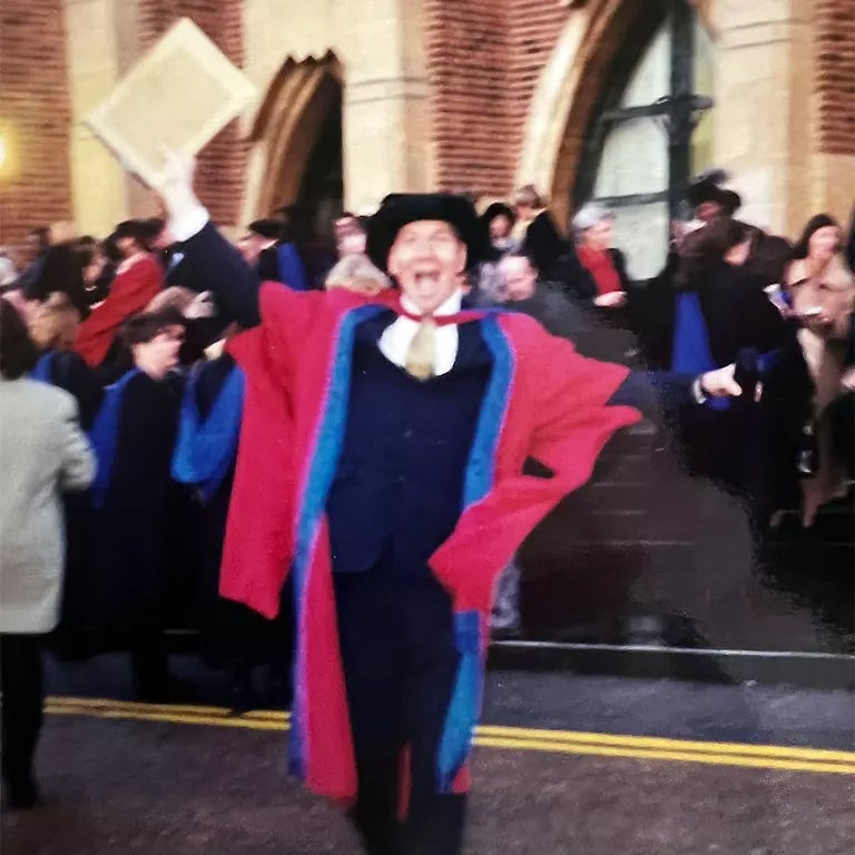 Dr. Ken Baron in cap and gown