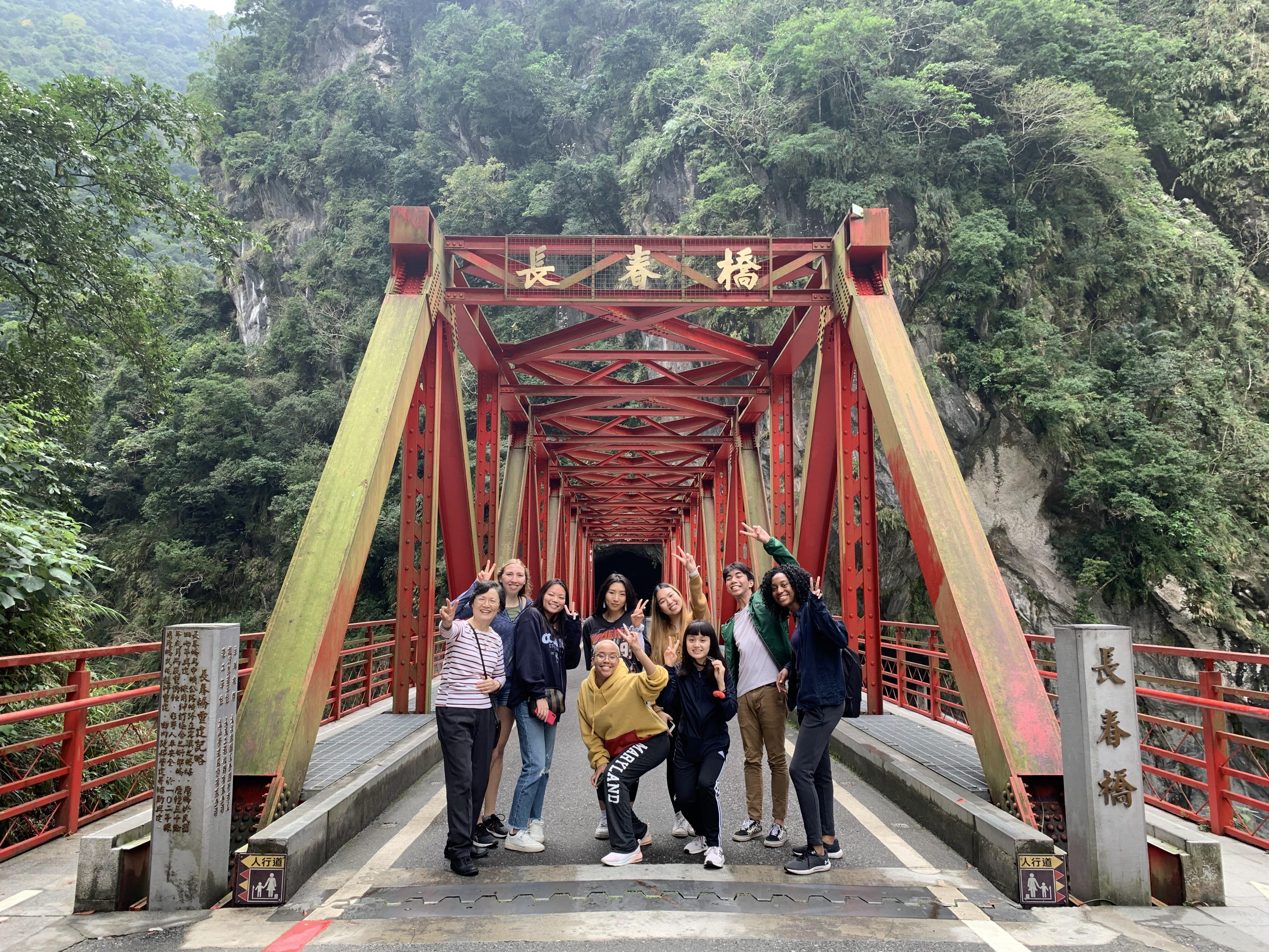 Students on a Maryland led progam stand on a bridge in Taiwan