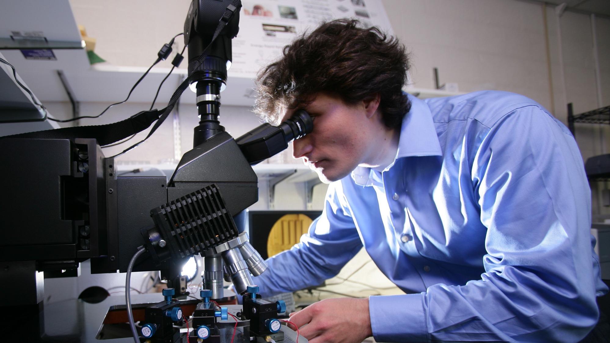 Researcher works in the micro robotics lab.