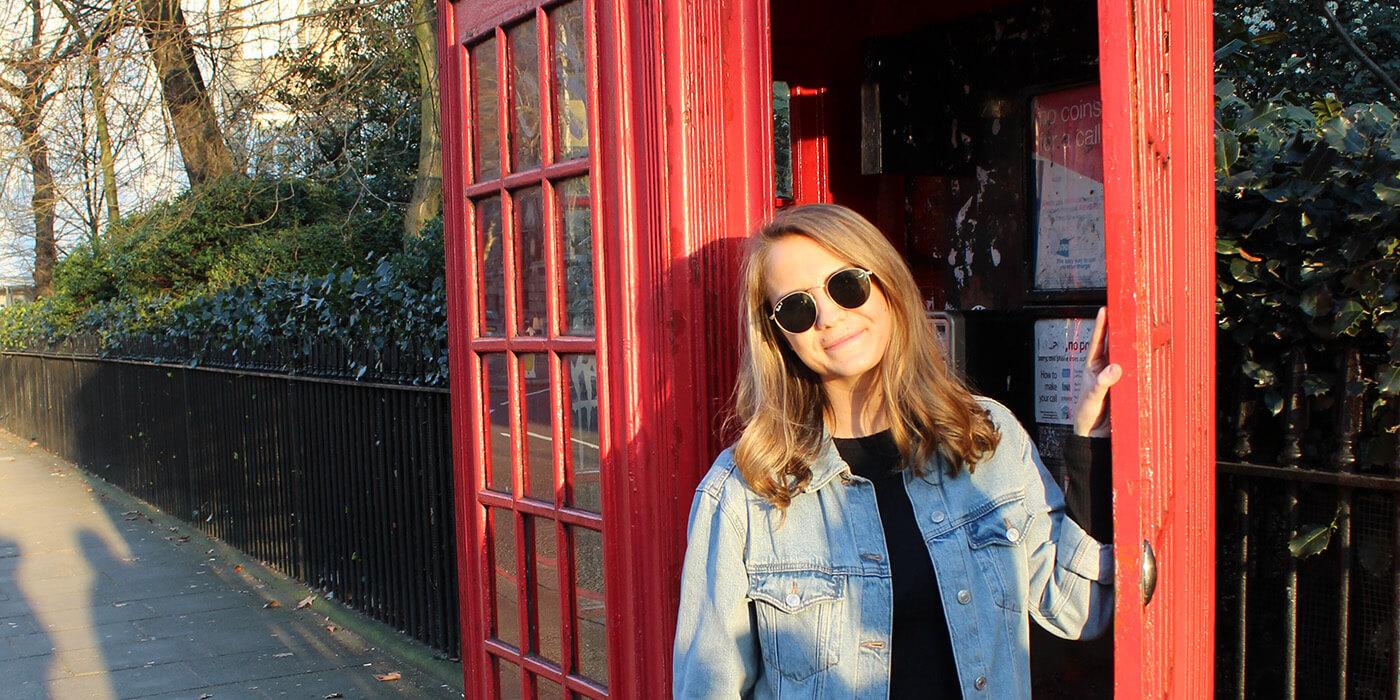 Carly Taylor at a phone booth in the uk