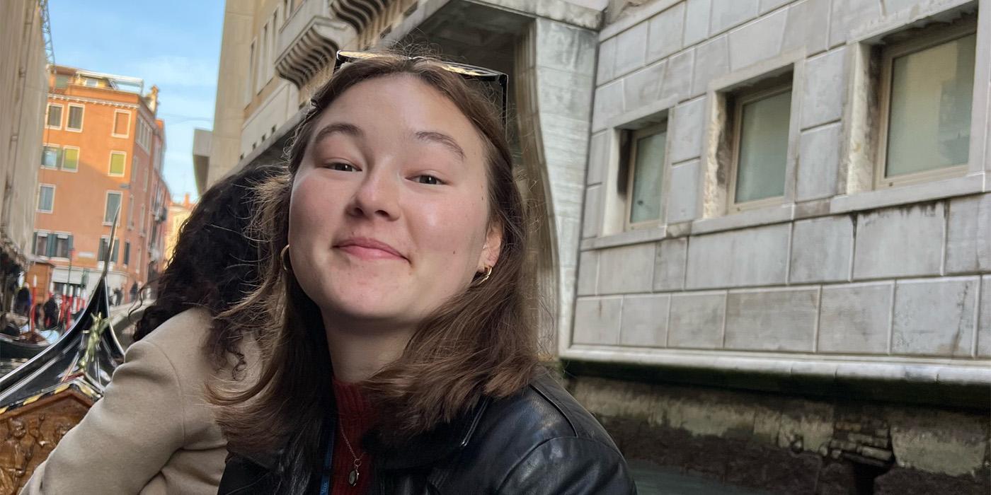 Rachel Reed sitting in a gondola in Rome, Italy