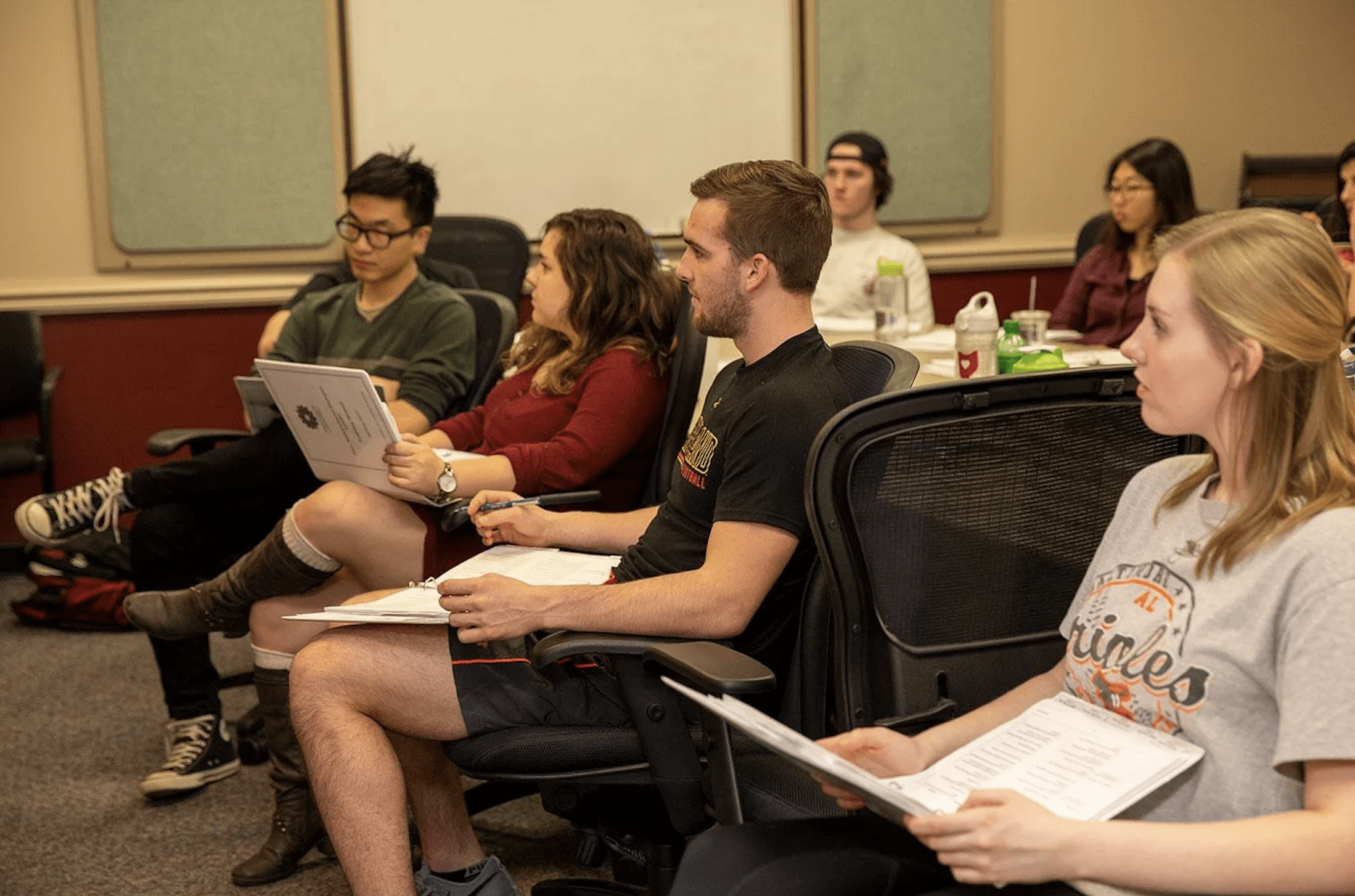 Students sit together in a classroom.