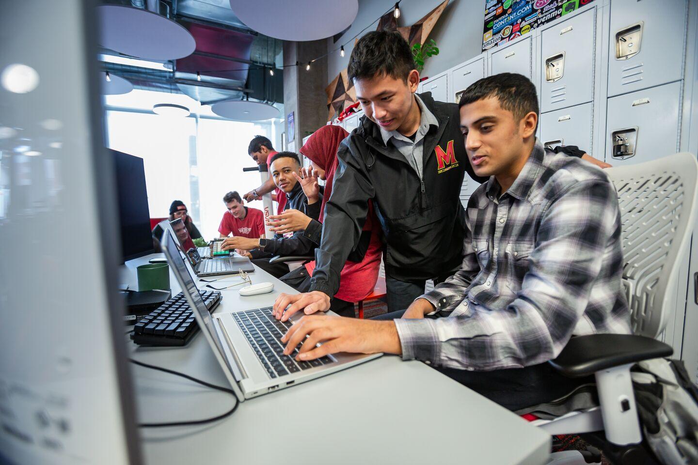 Students working in the Startup Shell suite, a student-run startup incubator and co-working space in the IDEA Factory.