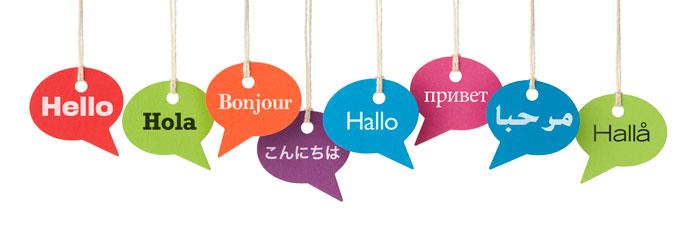 Illustration of conversation bubbles. Each bubble has the word "Hello" written in different languages.
