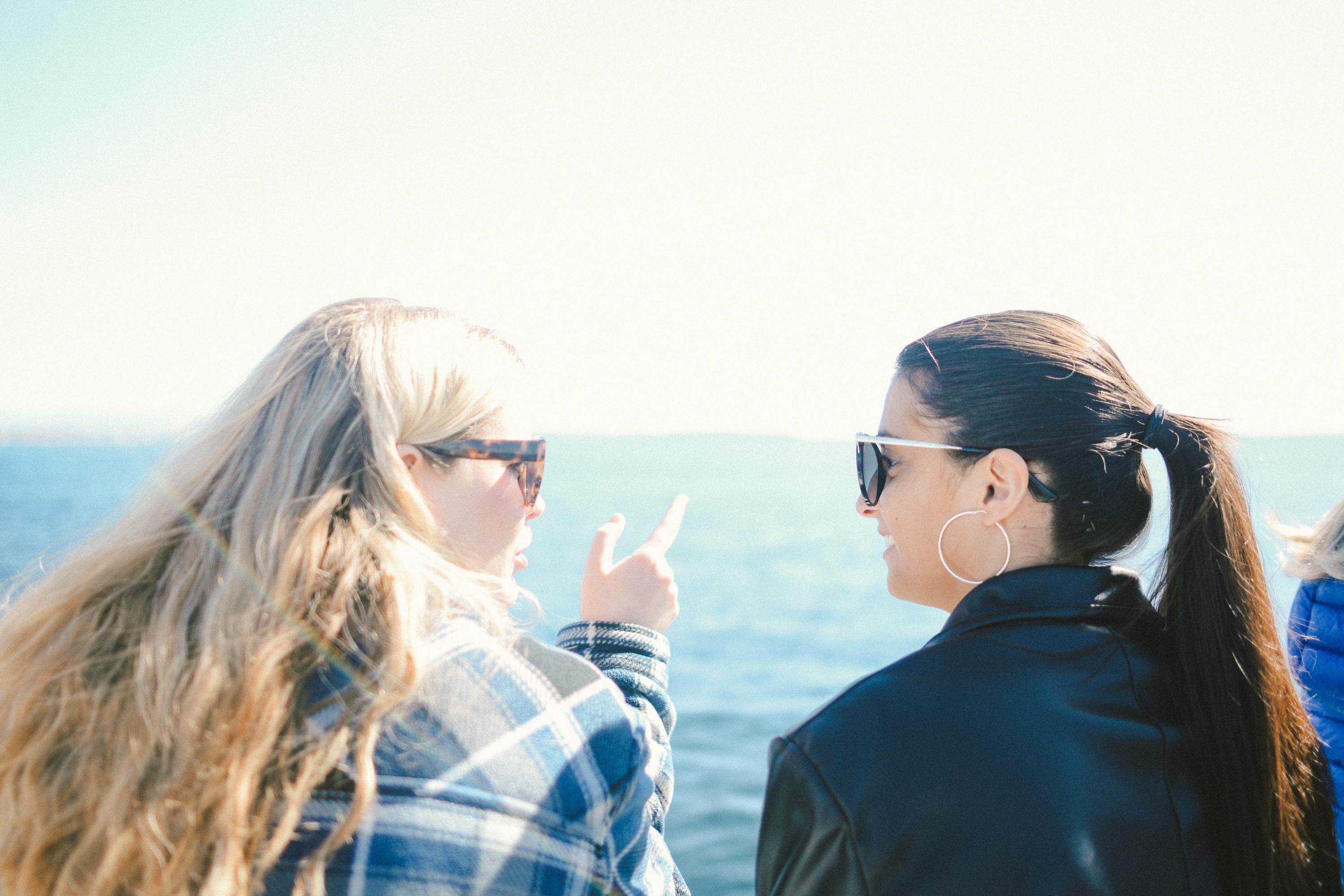 Two students chatting as they look out at the Mediterranean in Nice, France.