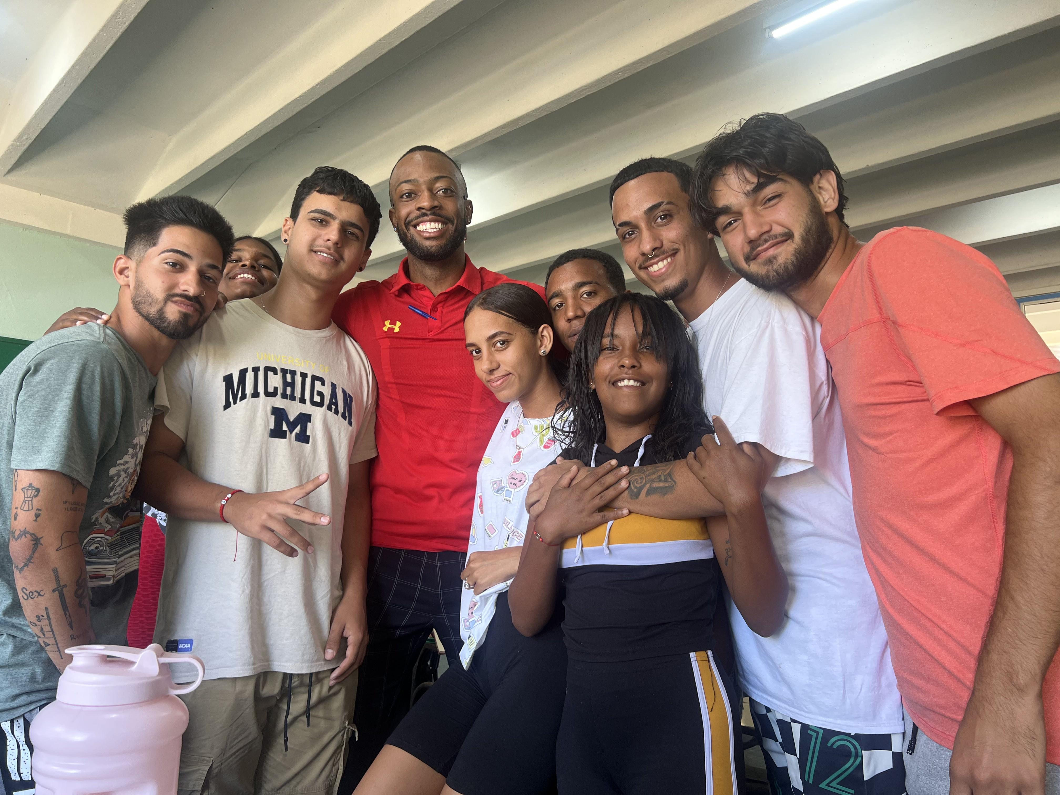 Tim Bryson with group of international student athletes