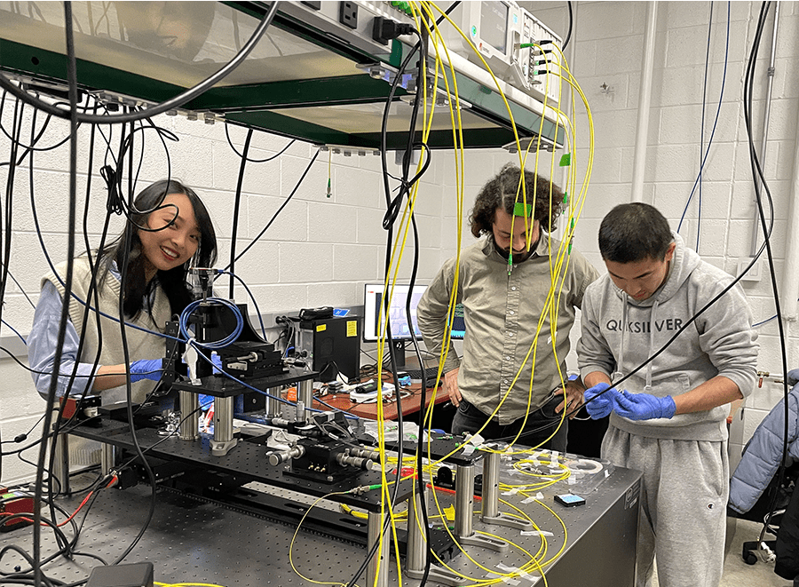 Dr. Chris Vargonias in the lab with UMD graduate students.