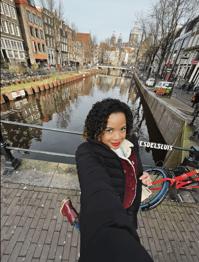 Jordan takes a selfie at a canal in Amsterdam