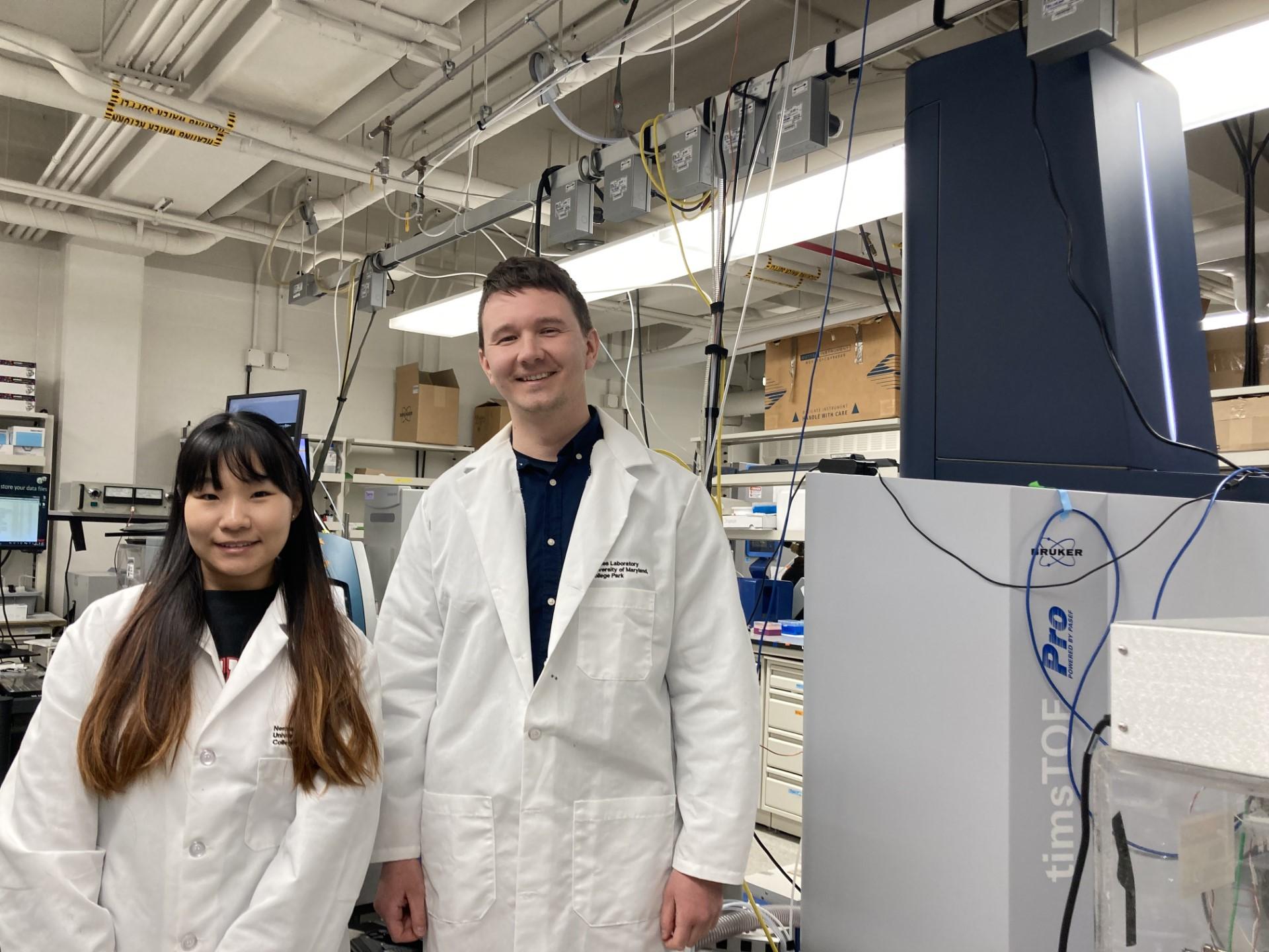 Dr. David Virag (left) poses with graduate student (right). 