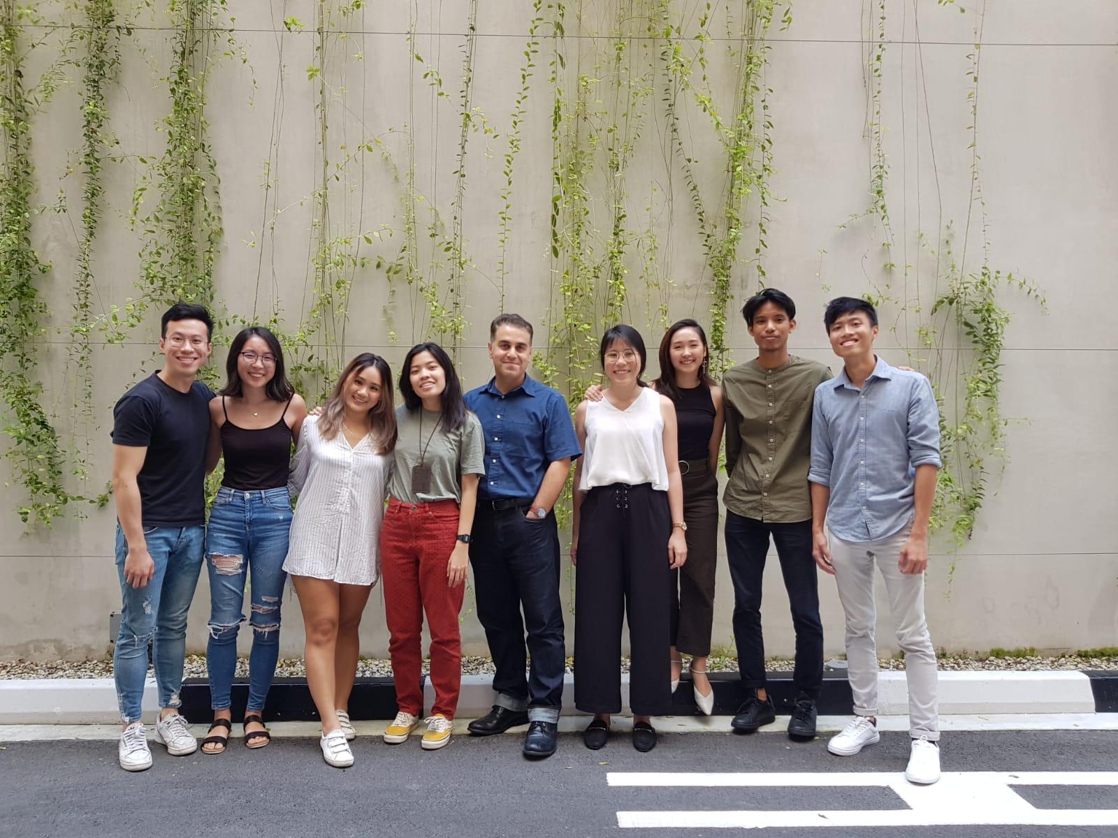 Dr. Mohammad Gharipour (pictured center) poses with his students in Singapore. 