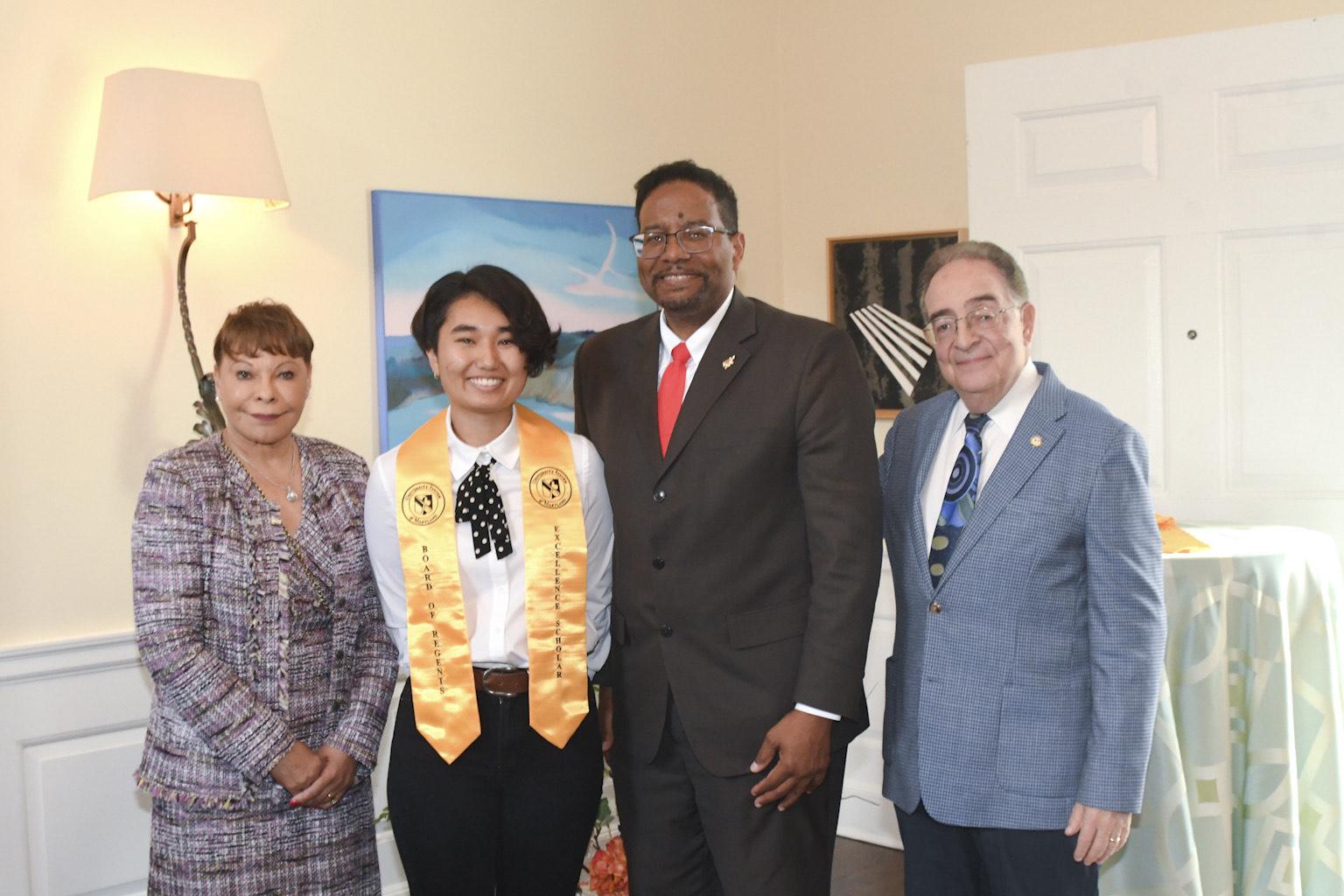 From left: Linda R. Gooden, Board of Regents Chair, Elizabeth "Jwi" Brown '26, UMD President Dr. Darryll J. Pines, and Jay Perman, Chancellor, University System of Maryland