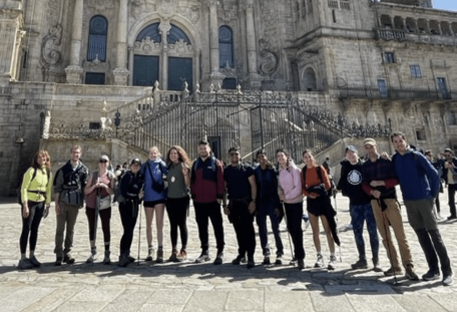 UMD-Spring Break: Spain: El Camino de Santiago de Compostela/Saint James Way students pose in front of the shrine of St. James.