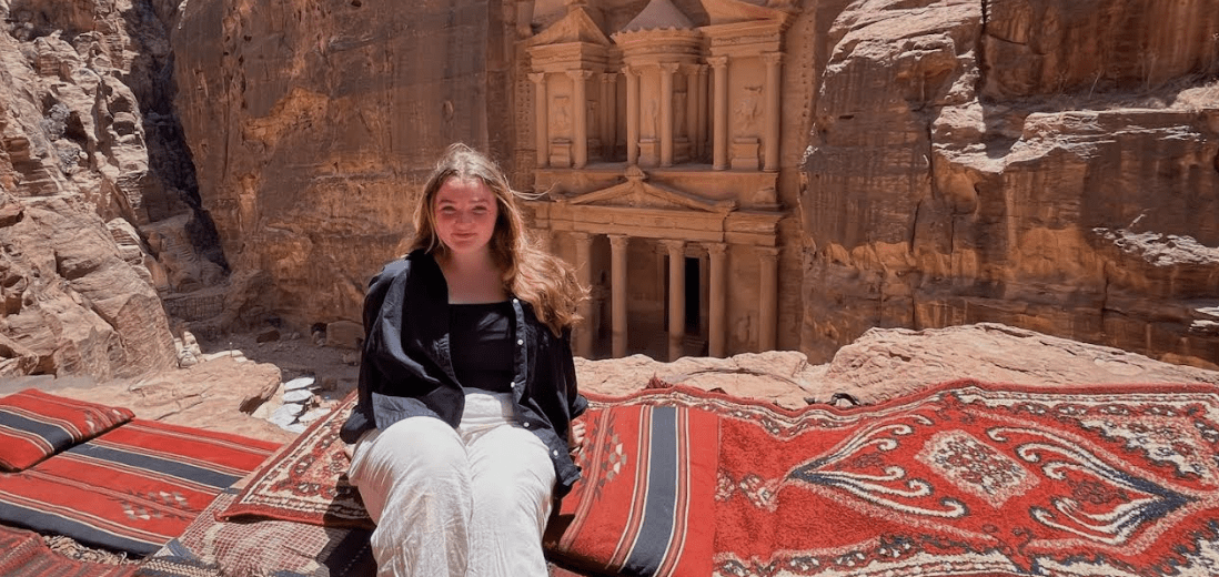 Amaya Greenberg '25 poses in front of Petra in Jordan. 