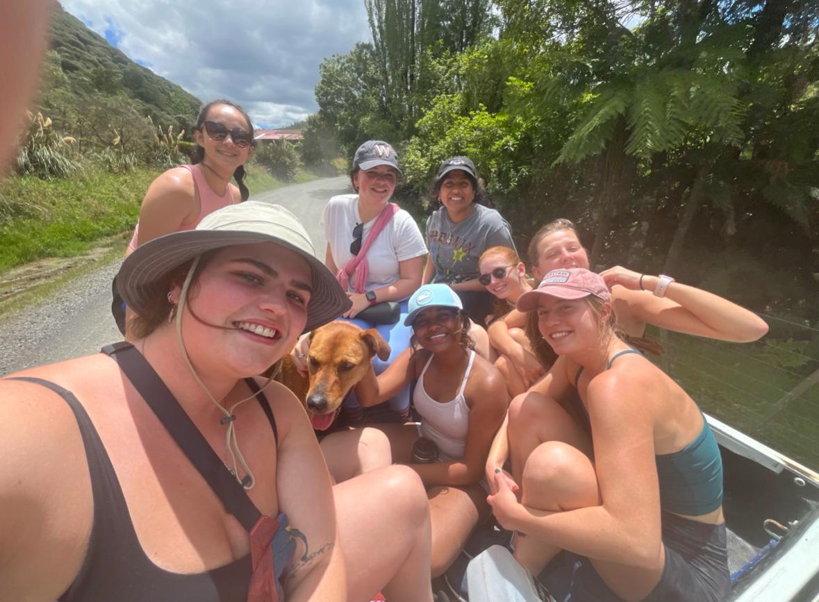 Ru and friends take a selfie while boating down a river in New Zealand.