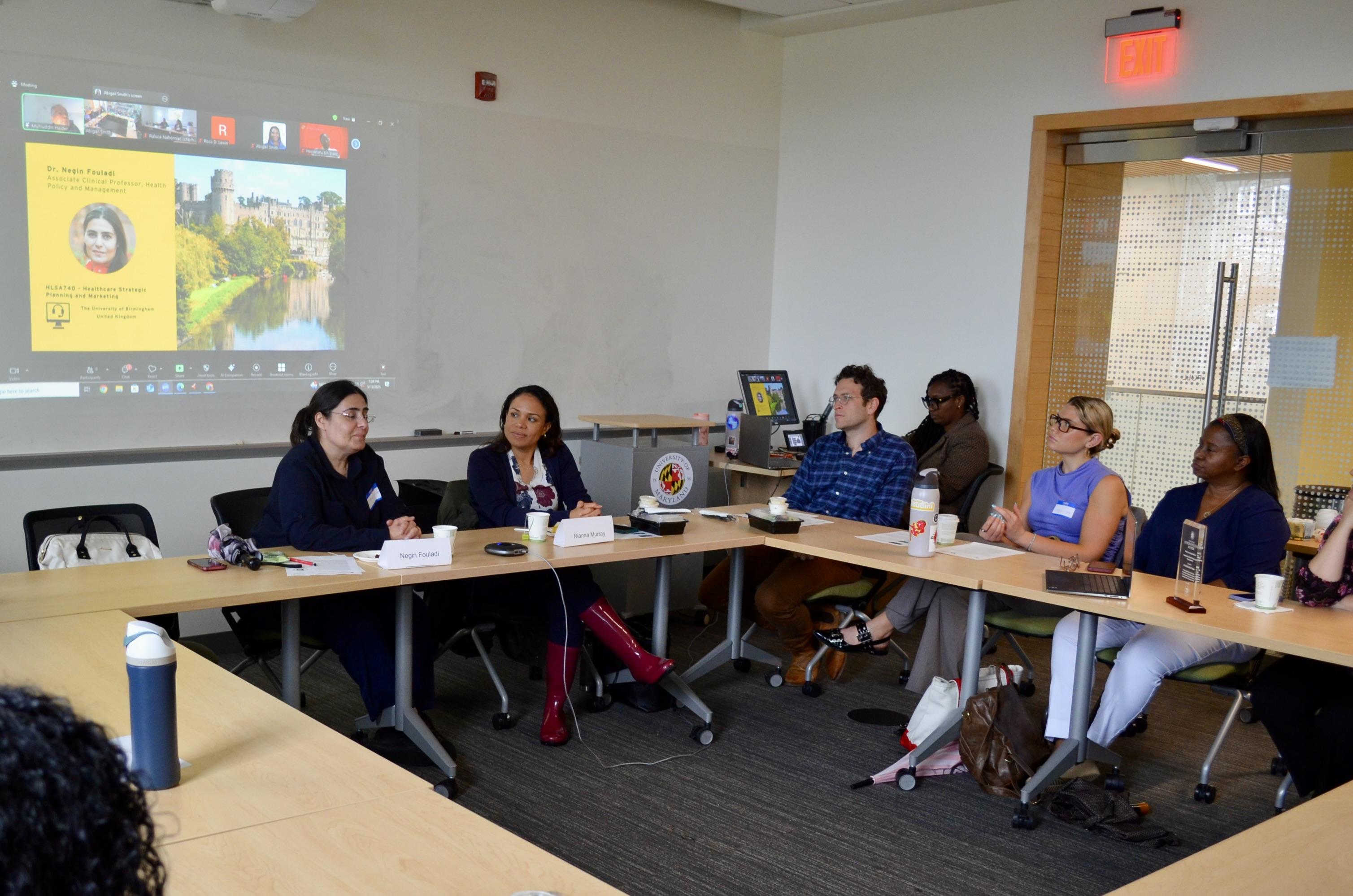  Dr. Negin Fouladi and Dr. Rianna Murray speak to attendees at the Global Classrooms Showcase