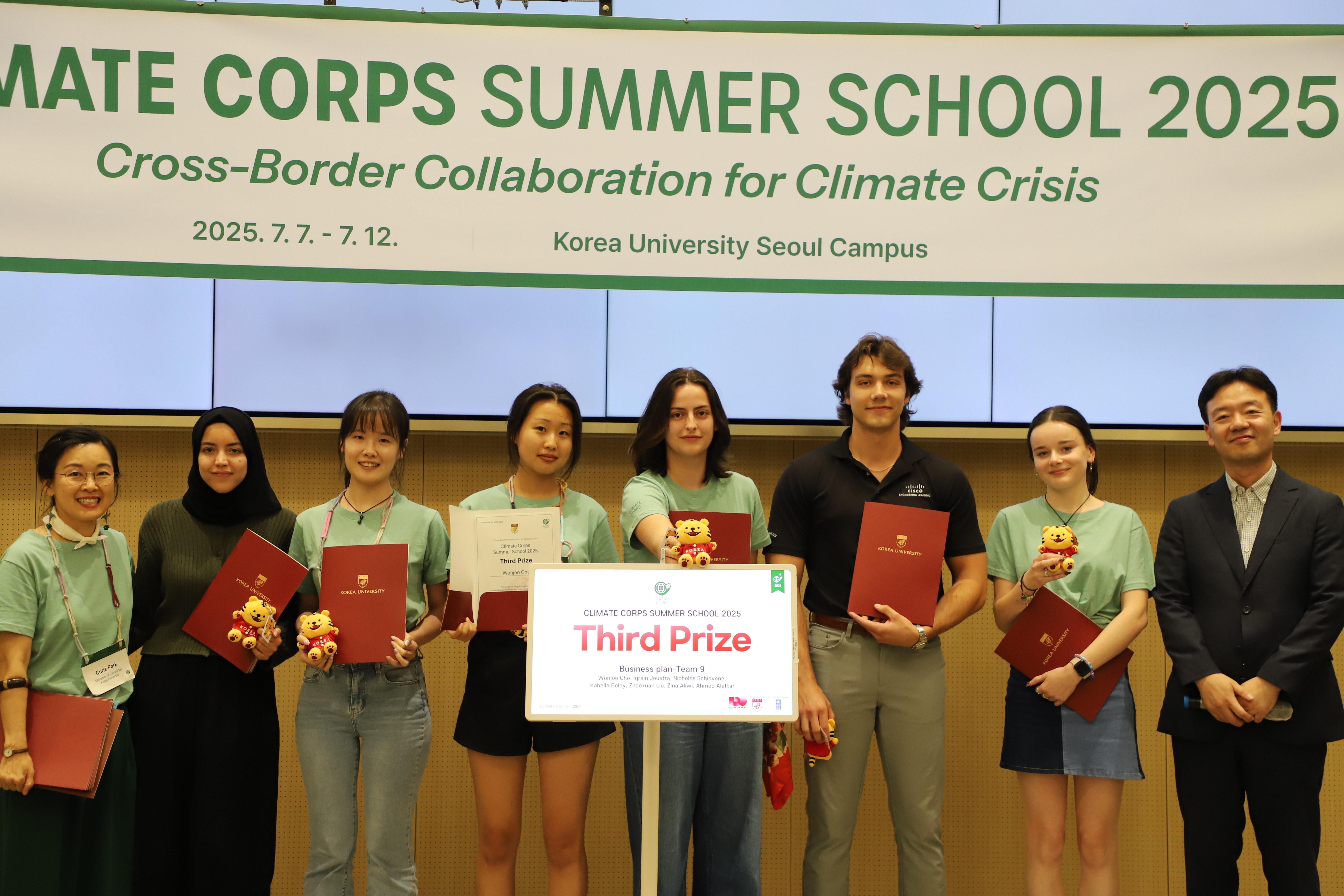 Students pose with certificates and a “Third Prize” sign at the Climate Corps Summer School awards ceremony at Korea University.