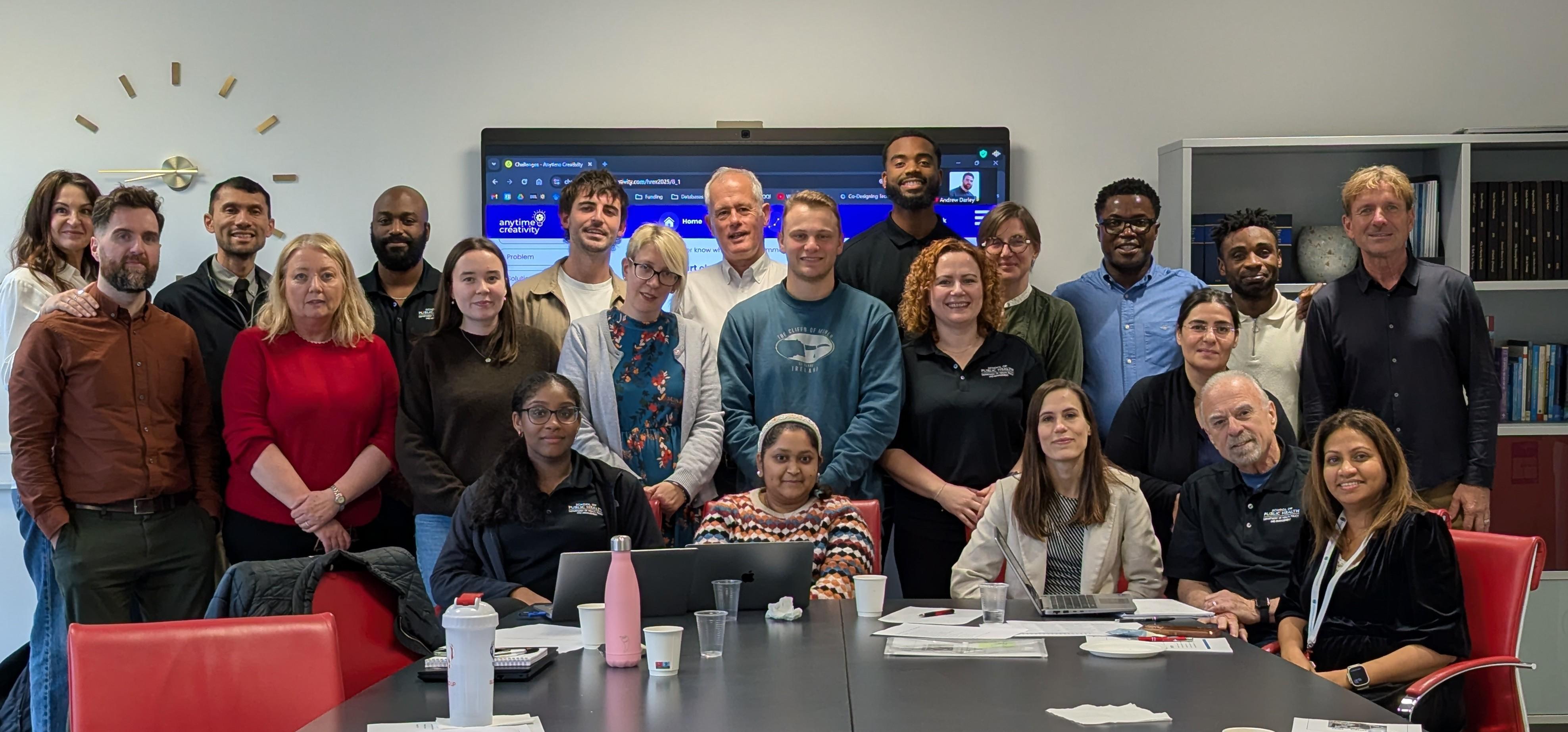 Members gather around a conference table at the Professional Development Workshop for Students and Early Career Researchers at the 2025 UCD U21HREx Symposium